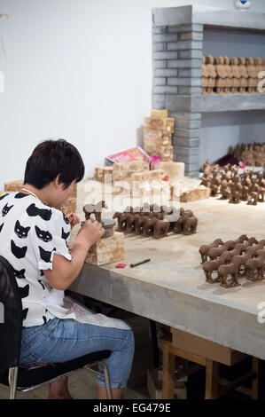 Miniature terracotta horses being made in a factory in Xian, Shaanxi Province, China Stock Photo