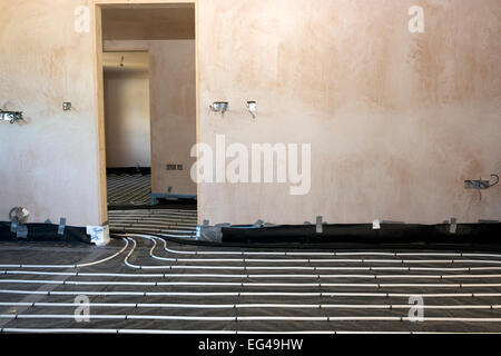 Underfloor heating pipes in a newly built house Stock Photo