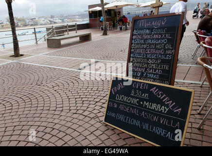 Board announcing British sports fixtures outside restaurant in Canary Islands, Spain Stock Photo