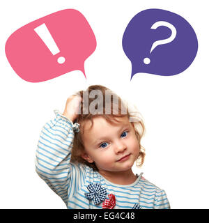 Thinking cute small kid girl with question and exclamation signs in bubbles isolated on white background Stock Photo