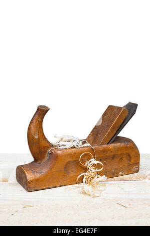 Old wooden plane on wooden table. Stock Photo