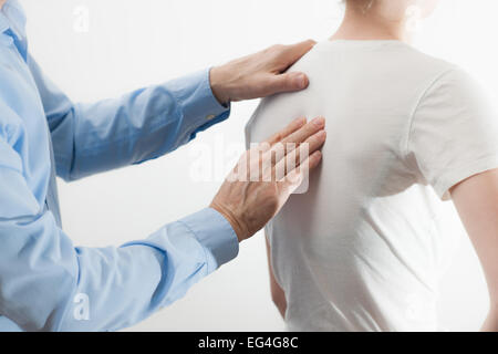 Chiropractic examination of the spine Stock Photo