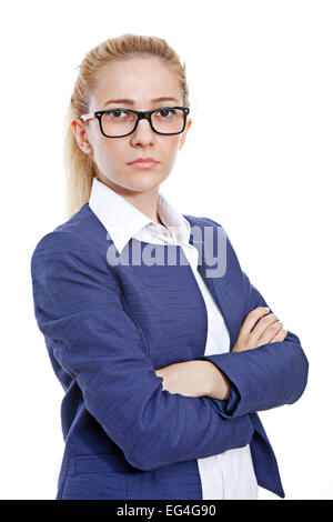 Seriously looking young businesswoman. She's looking at the camera. Stock Photo