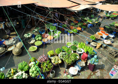 Bangladeshi vegetables vendors waiting for customers in Dhaka, Bangladesh. Stock Photo