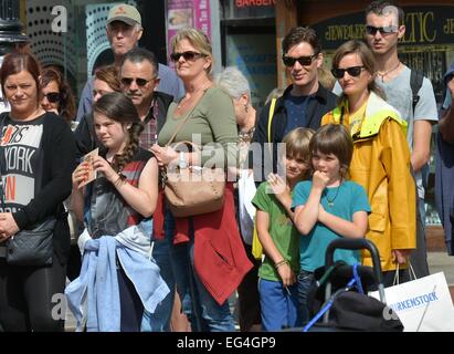 Cillian Murphy, wife Yvonne and their sons Malachy and Aran watch break-dance buskers Dublin City BBoys on Grafton Street  Featuring: Cillian Murphy,Yvonne McGuinness,Malachy Murphy,Aran Murphy Where: Dublin, Ireland When: 14 Aug 2014 Stock Photo