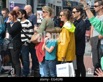 Cillian Murphy, wife Yvonne and their sons Malachy and Aran watch break-dance buskers Dublin City BBoys on Grafton Street  Featuring: Cillian Murphy,Yvonne McGuinness,Malachy Murphy,Aran Murphy Where: Dublin, Ireland When: 14 Aug 2014 Stock Photo