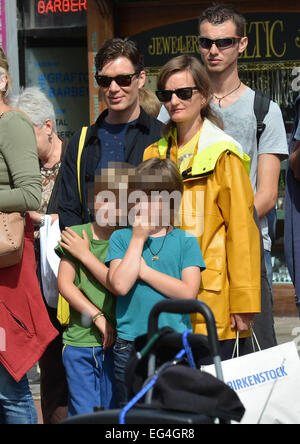 Cillian Murphy, wife Yvonne and their sons Malachy and Aran watch break-dance buskers Dublin City BBoys on Grafton Street  Featuring: Cillian Murphy,Yvonne McGuinness,Malachy Murphy,Aran Murphy Where: Dublin, Ireland When: 14 Aug 2014 Stock Photo