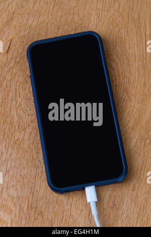 Apple iPhone recharging Stock Photo