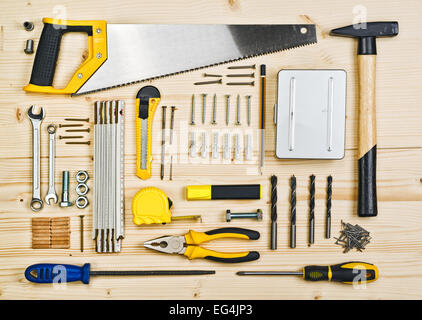 Assorted Woodwork and Carpentry or Construction Tools on Pine Wood Texture Background. Stock Photo