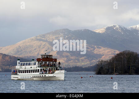 Lake Windermere, Cumbria, UK. 16th February, 2015. UK Weather: Last of the snow on the high fells Boat trips on the  steamer MV Teal , in its 80th year ,(launched 1936) back on Lake Windermere for half term after its annual service Credit:  Gordon Shoosmith/Alamy Live News Stock Photo