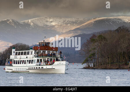 Lake Windermere, Cumbria, UK. 16th February, 2015. UK Weather: Last of the snow on the high fells Boat trips on the  steamer MV Teal , in its 80th year ,(launched 1936) back on Lake Windermere for half term after its annual service Credit:  Gordon Shoosmith/Alamy Live News Stock Photo