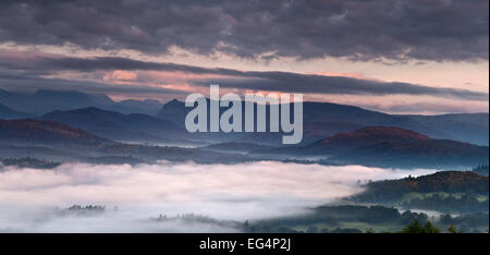 Inversion covers the valley floor looking towards the Langdale Pikes, Lake District, Cumbria, England from Orrest Head Stock Photo