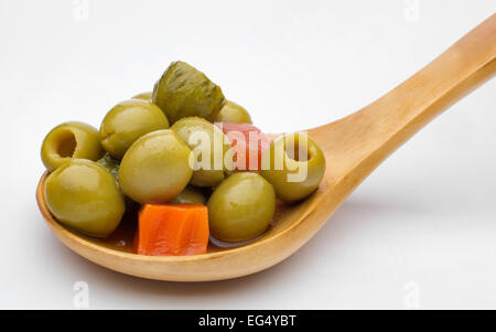 Pickled gherkins olives onions carrots garlic red pepper chili Stock Photo