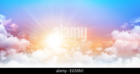 Panoramic sunrise. The sun breaking through white clouds. High resolution sky background. Stock Photo