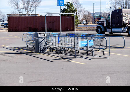 Shopping carts inside a corral in a WalMart parking lot in Oklahoma City, Oklahoma, USA. Stock Photo