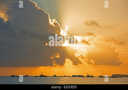 A dramatic sunrise over the sea. Stock Photo
