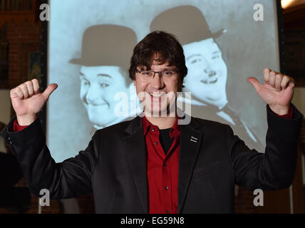 Berlin, Germany. 24th Jan, 2015. dpa-EXKLUSIVE - Pianist Carsten-Stephan Graf von Bothmer stands in front of screen which displays the Silent film comedians Stan Laurel and Oliver Hardy at the 'Passionskirche' church in Berlin, Germany, 24 January 2015. Pianist Graf von Bothmer performs live music as part of a series of silent films. Photo: Jens Kalaene/dpa/Alamy Live News Stock Photo