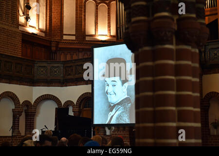 Berlin, Germany. 24th Jan, 2015. dpa-EXCLUSIVE - Silent film comedian Stan Laurel is on display on a screen at the 'Passionskirche' church in Berlin, Germany, 24 January 2015. Pianist Carsten-Stephan Graf von Bothmer performs live music as part of a series of silent films. Photo: Jens Kalaene/dpa/Alamy Live News Stock Photo