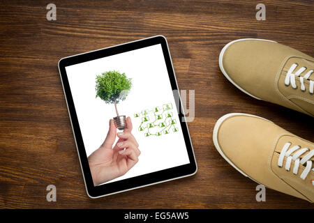 Digital tablet computer with  social networks concept on old wooden Stock Photo