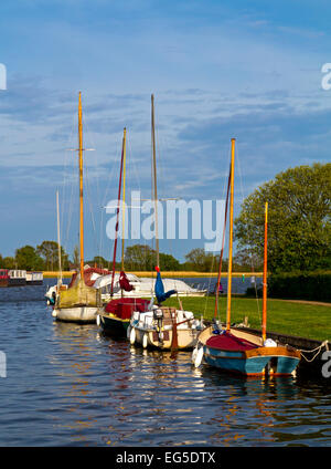 Sailing boats moored at Hickling Staithe in the Norfolk Broads an area of inland waterways in East Anglia England UK Stock Photo