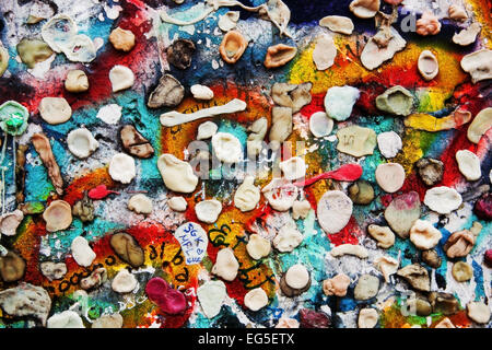 Part of Berlin Wall with graffiti and chewing gums stuck on it. Potsdamer Platz, Berlin, Germany Stock Photo