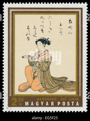 HUNGARY - CIRCA 1971: stamp printed in Hungary shows seated courtesan, by Harunobu, the same inscription, series 'Japanese Print Stock Photo