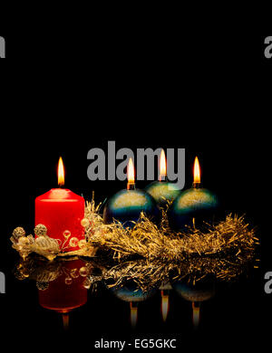 Red candles and christmas balls Stock Photo
