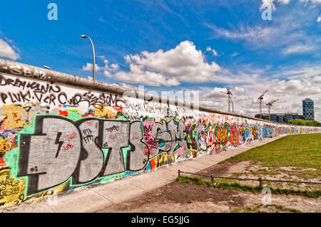 BERLIN, GERMANY - June 10, 2013: memorable segment of the Wall Berliner Mauer from communist history, which collapsed in 1989, i Stock Photo
