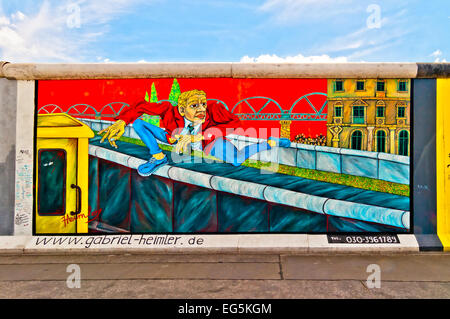 BERLIN, GERMANY - JUNE 10, 2013:  memorable segment of the Wall with work of artist Gabriel Heimler in Berlin, Germany. This wor Stock Photo
