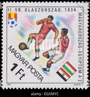 HUNGARY - CIRCA 1982: A stamp printed in Hungary from the 'World Cup Football Championship, Spain ' issue shows Hungary v. Egypt Stock Photo