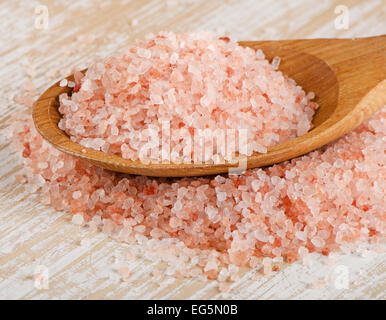 himalayan  salt in  wooden spoon. Selective focus Stock Photo