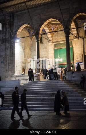 ISTANBUL, Turkey / Türkiye — Situated in the busy Eminonu quarter of Istanbul, at the southern end of the Galata Bridge, the New Mosque (or Yeni Cami) dates to around 1665. It's large prayer hall is decorated in the distinctive Ottoman imperial style. Stock Photo