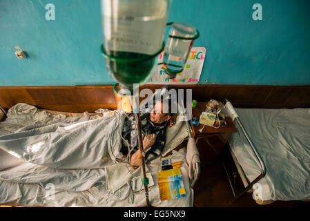 ATO soldier getting medical treatment in Military Hospital, Ukraine. During Ukrainian-Russian conflict military hospitals overloaded for more than 30%. Most of clinics work with old soviet medical equipment, and lack of modern machines such as tomographs. 16 of February. Photo by Oleksandr Rupeta Stock Photo