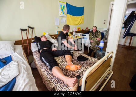 ATO soldiers getting medical treatment in Military Hospital, Ukraine. During Ukrainian-Russian conflict military hospitals overloaded for more than 30%. Most of clinics work with old soviet medical equipment, and lack of modern machines such as tomographs. 16 of February. Photo by Oleksandr Rupeta Stock Photo