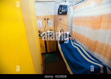 ATO soldier getting treatment in physiotherapy ward in Military Hospital, Ukraine. During Ukrainian-Russian conflict military hospitals overloaded for more than 30%. Most of clinics work with old soviet medical equipment, and lack of modern machines such as tomographs. 16 of February. Photo by Oleksandr Rupeta Stock Photo