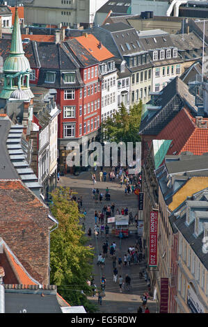 People strolling through the pedestrianized streets of Copenhagen's central shopping district Stock Photo