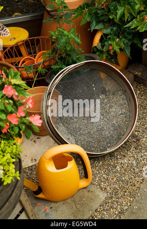 Soil screen, water can Stock Photo