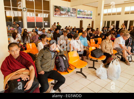 Air passengers waiting in the departure lounge, Heho airport, Myanmar ( Burma ), Asia Stock Photo