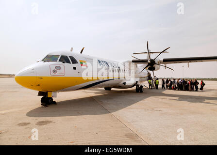 Passengers boarding an Air KBZ plane on the ground at Mandalay Airport, Myanmar ( Burma ), Asia Stock Photo