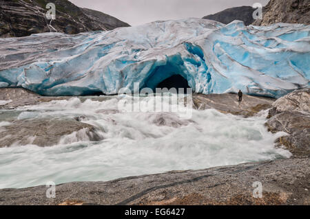 Jostedalsbreen glacier and glacial river in Norway - melting because of Global warming. Water blurred long exposure. Stock Photo