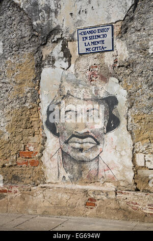 Cartagena, Colombia - February 23, 2014 - Beautiful street art covers the walls of the colorful streets of Cartagena's Getsemani Stock Photo