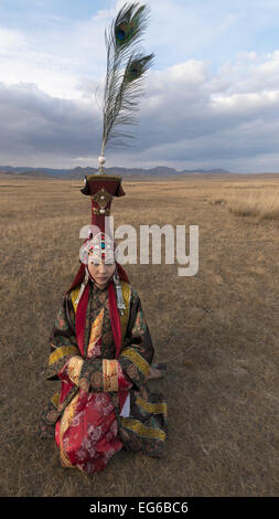 Mongolian traditional attire for a queen, steppes and mountains near ...