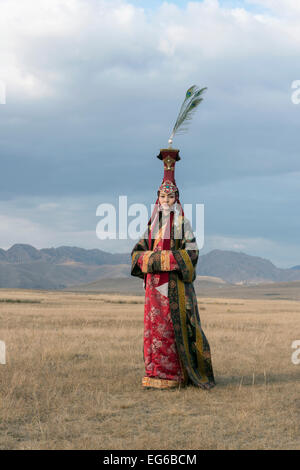 Mongolian traditional attire for a queen, steppes and mountains near ...