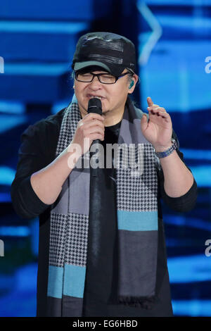 Beijing, China. 18th Feb, 2015. File photo shows singer Liu Huan performing during a rehearsal of the 2015 Spring Festival gala in Beijing, capital of China. China's annual Spring Festival gala TV show, which includes songs, dances, traditional operas, skits, talk shows, acrobatics and martial art, will be broadcast live from 8 p.m. on Feb. 18. on multiple channels. The performance will also be promoted through websites and more than 10 foreign broadcasters. © Xinhua/Alamy Live News Stock Photo