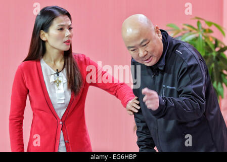 Beijing, China. 18th Feb, 2015. File photo shows comedians Guo Donglin (R) and Liu Tao performing during a rehearsal of the 2015 Spring Festival gala in Beijing, capital of China. China's annual Spring Festival gala TV show, which includes songs, dances, traditional operas, skits, talk shows, acrobatics and martial art, will be broadcast live from 8 p.m. on Feb. 18. on multiple channels. The performance will also be promoted through websites and more than 10 foreign broadcasters. © Xinhua/Alamy Live News Stock Photo