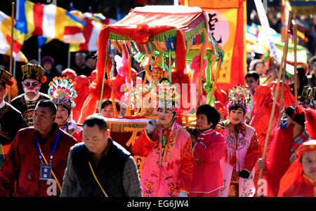 Beijing, China. 18th Feb, 2015. People take part in a traditional blessing ceremony in the Badachu Park in Beijing, capital of China, Feb. 18, 2015. The ceremony was the prelude to the new year temple fair which will be officially open to public on Feb. 19. Credit:  Li Jundong/Xinhua/Alamy Live News Stock Photo