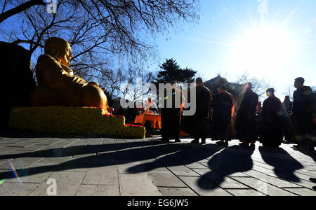 Beijing, China. 18th Feb, 2015. Monks of Lingguang Temple hold a traditional blessing ceremony in the Badachu Park in Beijing, capital of China, Feb. 18, 2015. The ceremony was the prelude to the new year temple fair which will be officially open to public on Feb. 19. Credit:  Li Jundong/Xinhua/Alamy Live News Stock Photo