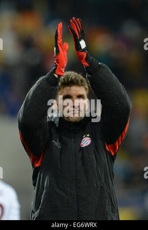 Lviv, Ukraine. 17th Feb, 2015. Munich's Thomas Mueller leaves the pitch after the UEFA Champions League Round of 16 first leg soccer match between Shakhtar Donetsk and FC Bayern Munich at the Arena in Lviv, Ukraine, 17 February 2015. Photo: Andreas Gebert/dpa/Alamy Live News Stock Photo