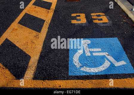 Numbered car parking for disabled people Stock Photo