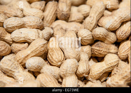 Detail of heap of peanuts in market, focus at center Stock Photo